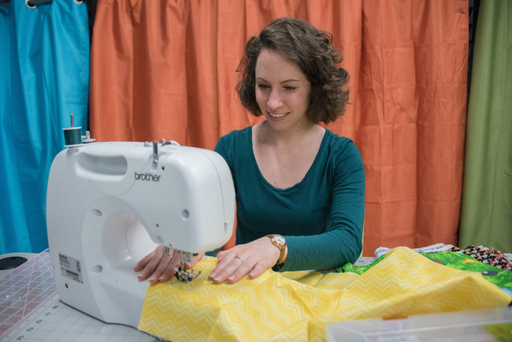 Woman using a sewing machine